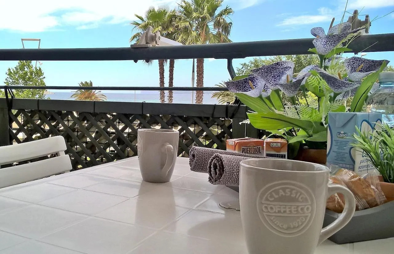 Apartment Orange Sunset, seaview&beach front Alghero